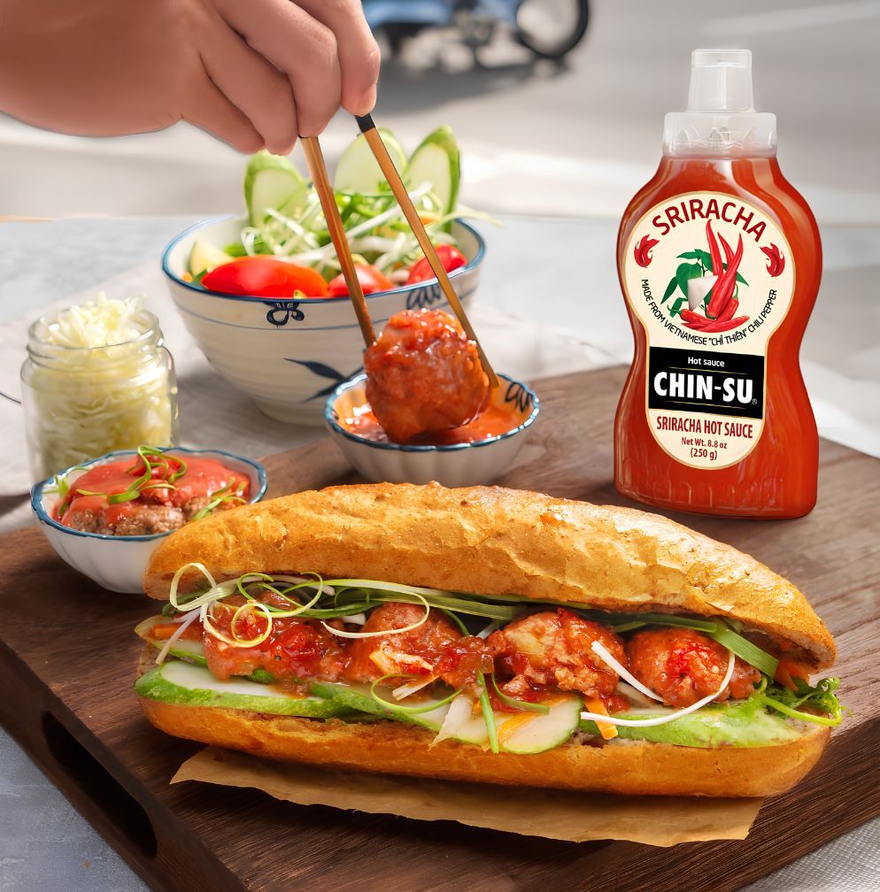 chin-su sriracha hot sauce with banh mi