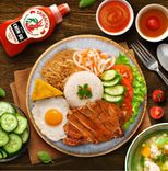 chin-su sriracha hot sauce with com tam